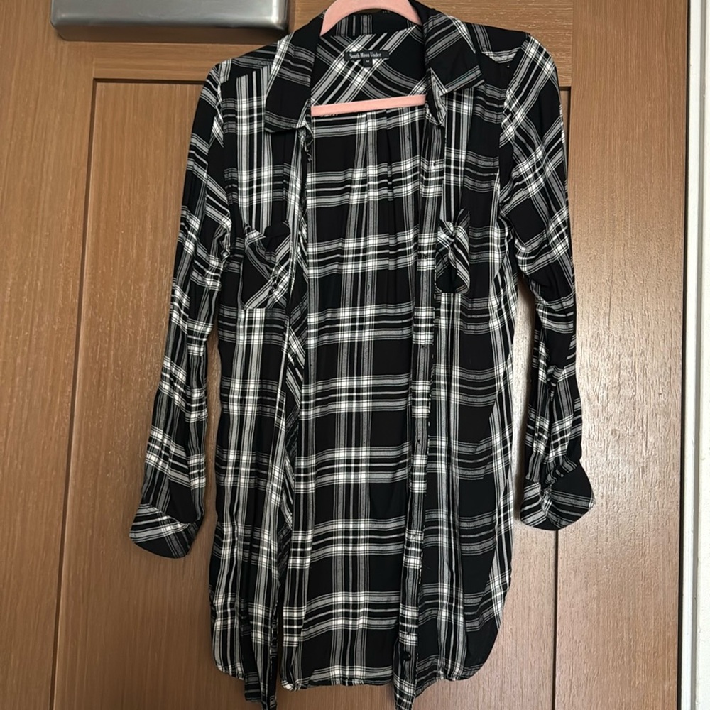 South moon under black and white flannel